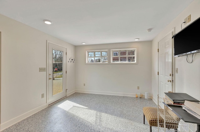 interior space with baseboards