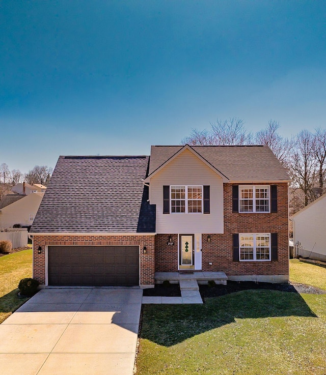 view of front facade with brick siding, driveway, an attached garage, and a front yard