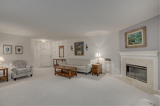 carpeted living room featuring a high end fireplace