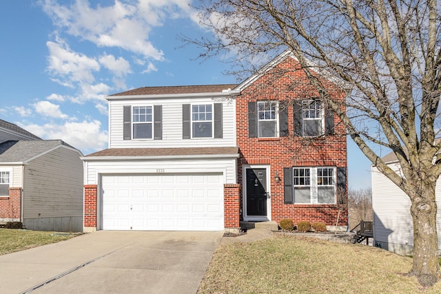 traditional home with concrete driveway, a garage, brick siding, and a front lawn