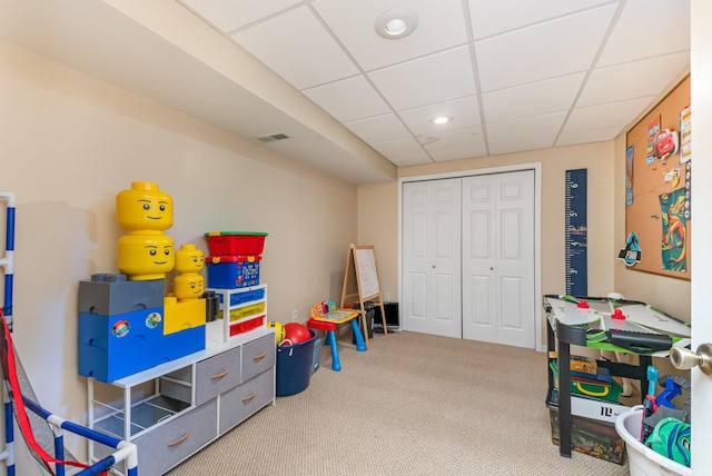 playroom featuring recessed lighting, visible vents, a paneled ceiling, and carpet flooring