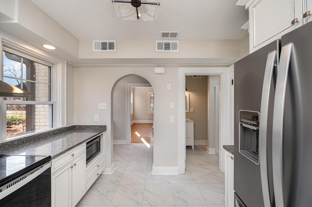 kitchen with visible vents, marble finish floor, and appliances with stainless steel finishes