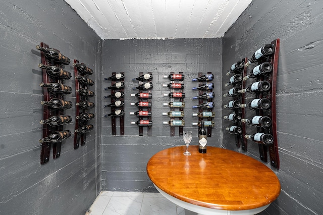 wine room with marble finish floor