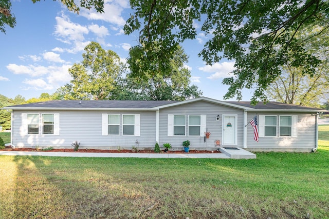 ranch-style house with a front yard