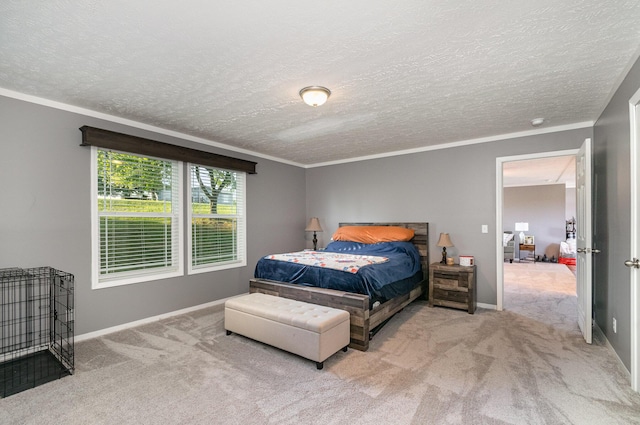 bedroom featuring baseboards, carpet floors, a textured ceiling, and ornamental molding