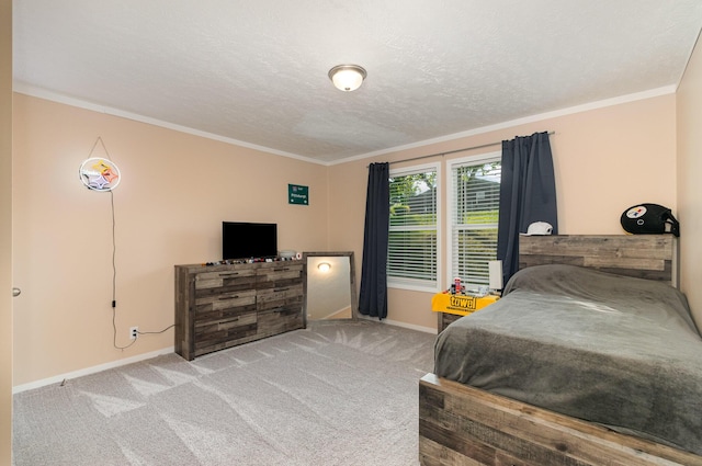 bedroom with baseboards, a textured ceiling, carpet, and ornamental molding