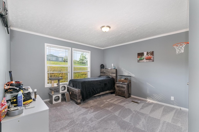 bedroom featuring baseboards, a textured ceiling, crown molding, and carpet