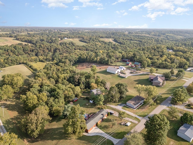 drone / aerial view with a view of trees