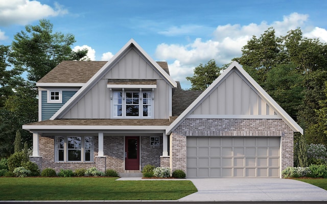 view of front of home featuring brick siding, board and batten siding, concrete driveway, a front yard, and a garage