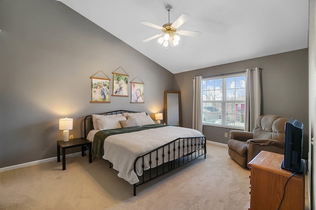 bedroom with light carpet, ceiling fan, baseboards, and vaulted ceiling