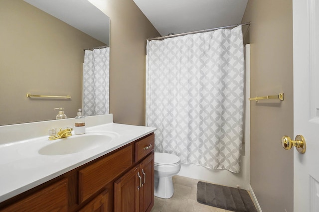 bathroom with vanity, toilet, and shower / bath combo with shower curtain