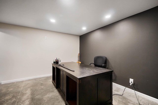 office area with recessed lighting, baseboards, and concrete floors