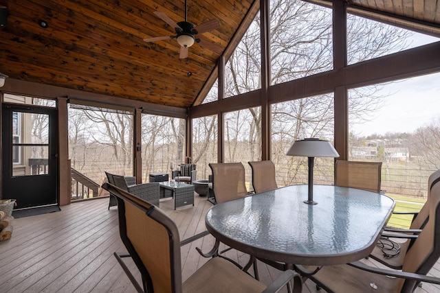 sunroom with wooden ceiling, lofted ceiling, and a ceiling fan