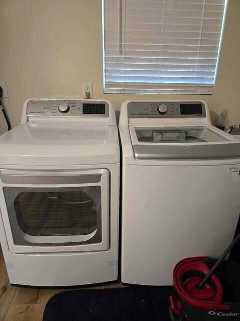125 Smith Ave, Warsaw, KY 41095 - laundry room featuring laundry area, wood finished floors, and separate washer and dryer