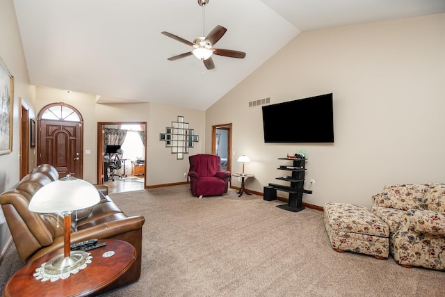 carpeted living room featuring baseboards, high vaulted ceiling, visible vents, and a ceiling fan