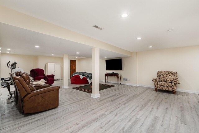 interior space featuring recessed lighting, baseboards, light wood-style floors, and visible vents