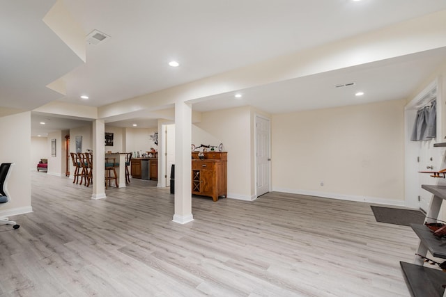 interior space with baseboards, visible vents, recessed lighting, and light wood-type flooring