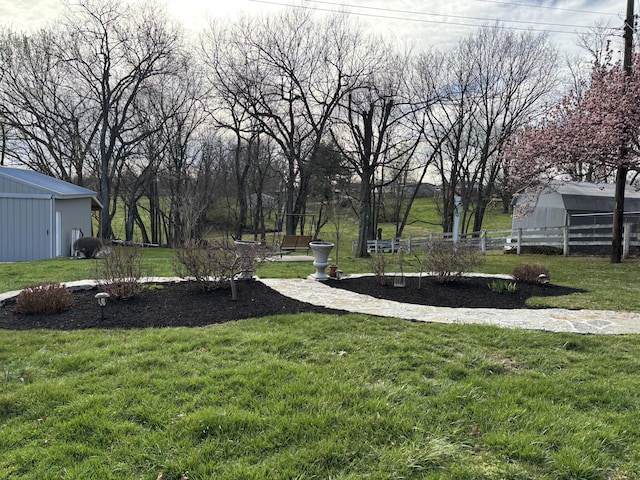 98 S Main St, Dry Ridge, KY 41035 - view of yard with fence, a pole building, and an outdoor structure