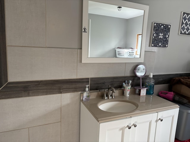 98 S Main St, Dry Ridge, KY 41035 - bathroom featuring vanity and decorative backsplash