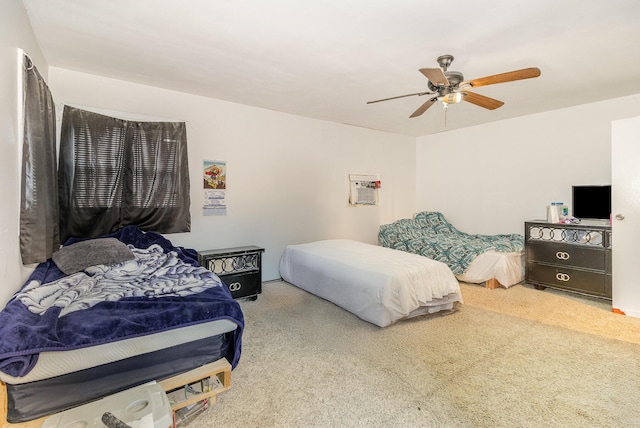 bedroom featuring an AC wall unit and ceiling fan
