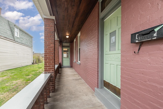 511 Highland Pike, Covington, KY 41014 - entrance to property with brick siding and covered porch