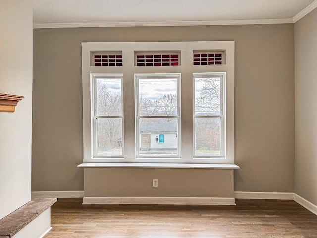 2750 Madison Ave, Covington, KY 41015 - room details featuring baseboards, crown molding, and wood finished floors