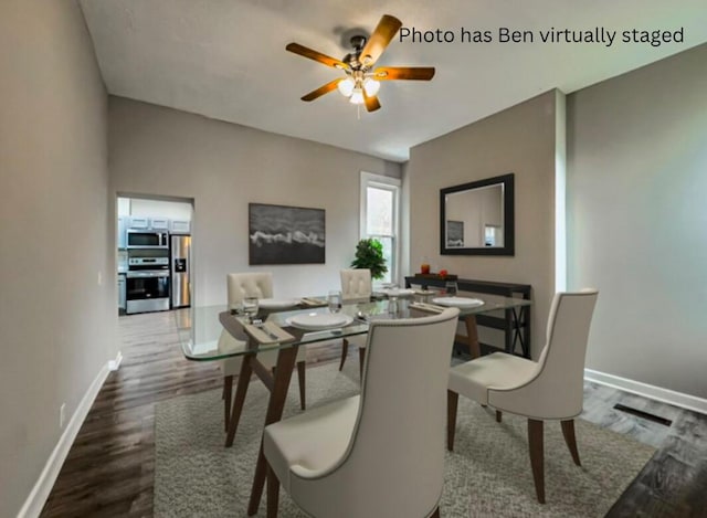 2750 Madison Ave, Covington, KY 41015 - dining room featuring dark wood-style flooring, baseboards, and ceiling fan