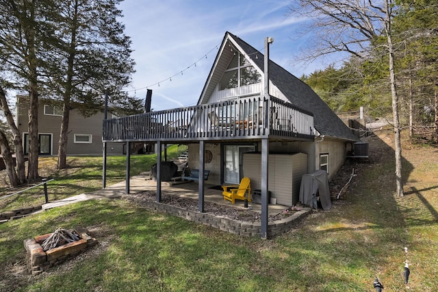 540 Summer Dr, Williamstown, KY 41097 - rear view of property with a wooden deck, central AC, a yard, an outdoor fire pit, and a patio area