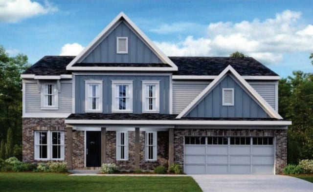 craftsman-style home with board and batten siding, brick siding, driveway, and a front lawn