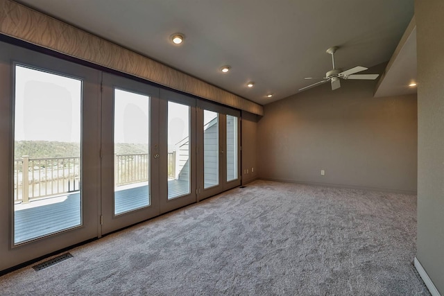 carpeted spare room with recessed lighting, visible vents, a ceiling fan, and baseboards