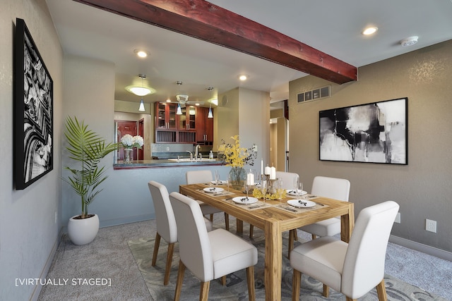 dining area with carpet, baseboards, beam ceiling, visible vents, and recessed lighting
