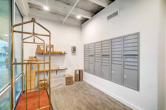 surrounding community with mail area and visible vents