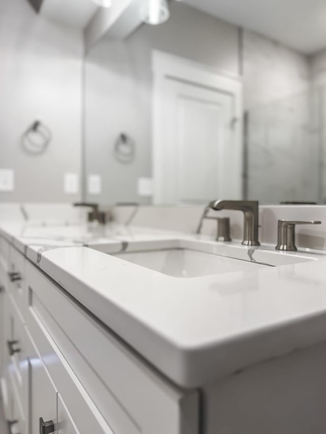 739 Manhattan Blvd Unit 103, Dayton, KY 41074 - bathroom with double vanity and a sink