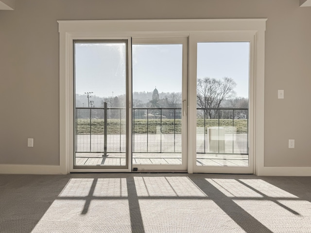739 Manhattan Blvd Unit 103, Dayton, KY 41074 - doorway to outside with baseboards, a wealth of natural light, and carpet floors