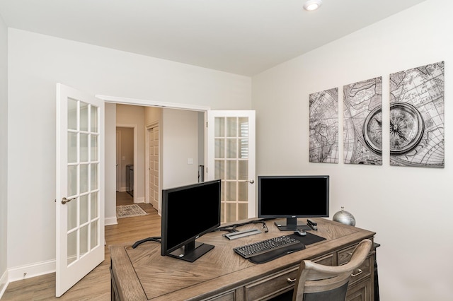 office with french doors, light wood-style floors, baseboards, and recessed lighting