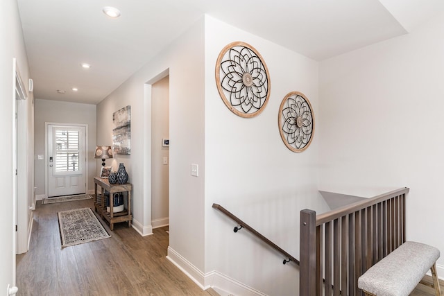 entrance foyer with wood finished floors, baseboards, and recessed lighting