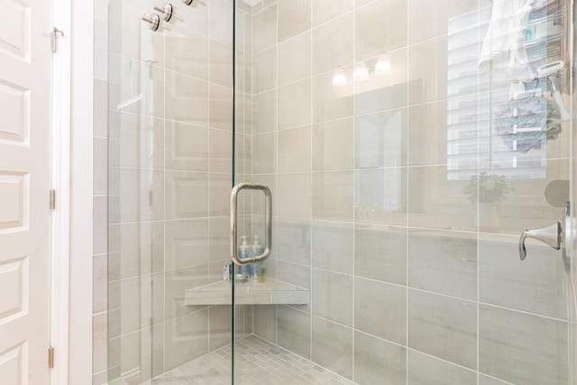 full bathroom with a shower stall