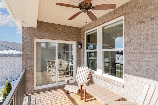 balcony featuring ceiling fan