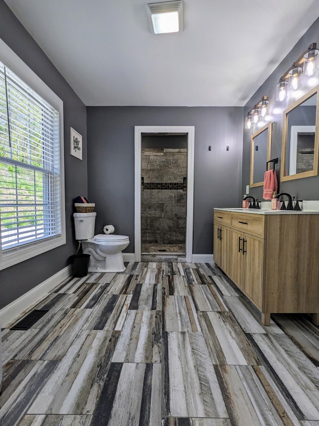 4400 Chipman Ridge Rd, Williamstown, KY 41097 - bathroom with double vanity, wood finished floors, and tiled shower