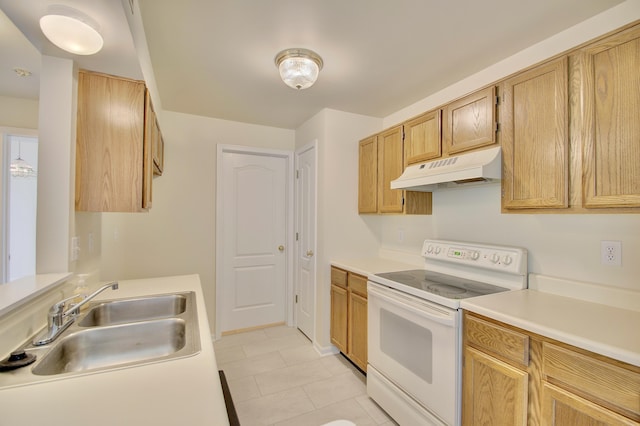 7370 Centrecrest Ln Unit E, Florence, KY 41042 - kitchen featuring under cabinet range hood, electric range, a sink, light countertops, and light tile patterned flooring