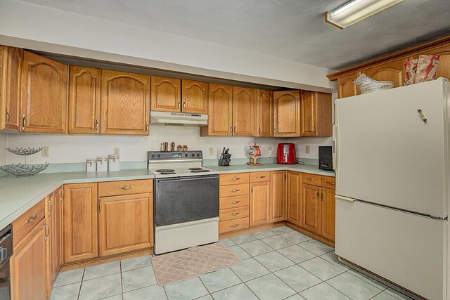 13471 Peach Grove Rd, California, KY 41007 - kitchen featuring under cabinet range hood, white appliances, light countertops, and brown cabinetry