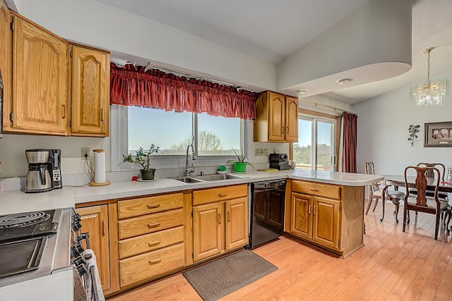 13471 Peach Grove Rd, California, KY 41007 - kitchen featuring vaulted ceiling, light countertops, stainless steel range, dishwasher, and a sink