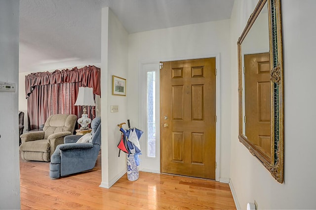 13471 Peach Grove Rd, California, KY 41007 - entrance foyer featuring baseboards and light wood-style floors
