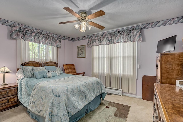 13471 Peach Grove Rd, California, KY 41007 - bedroom with a baseboard radiator, light colored carpet, a ceiling fan, and a textured ceiling