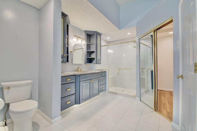 2141 Tantallon Dr, Fort Mitchell, KY 41017 - bathroom with vanity, baseboards, a shower stall, and toilet