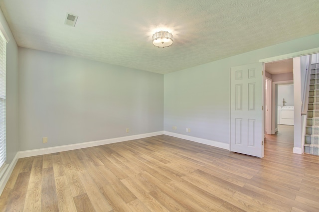2141 Tantallon Dr, Fort Mitchell, KY 41017 - spare room with baseboards, visible vents, stairway, and light wood-style floors