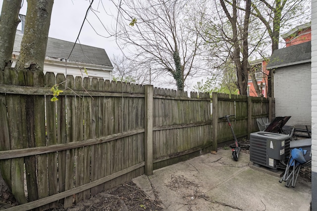 1706 Eastern Ave, Covington, KY 41014 - fenced backyard featuring central AC and a patio