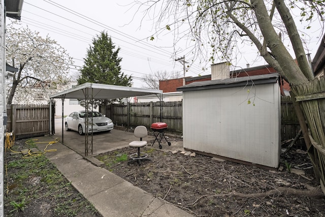 1706 Eastern Ave, Covington, KY 41014 - fenced backyard featuring a carport