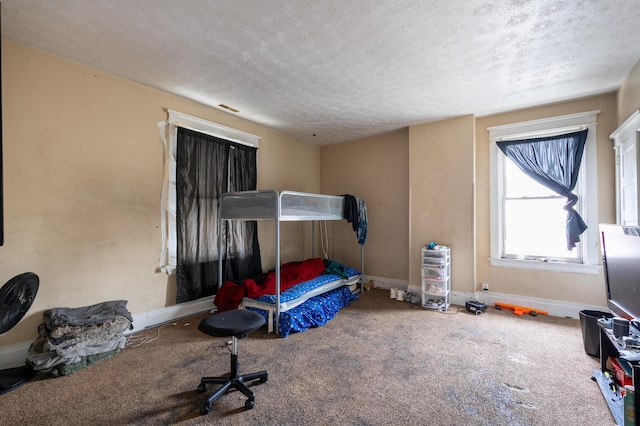 1706 Eastern Ave, Covington, KY 41014 - carpeted bedroom featuring a textured ceiling and baseboards