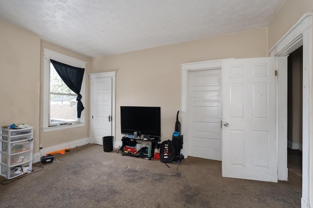 1706 Eastern Ave, Covington, KY 41014 - carpeted bedroom with baseboards and a textured ceiling